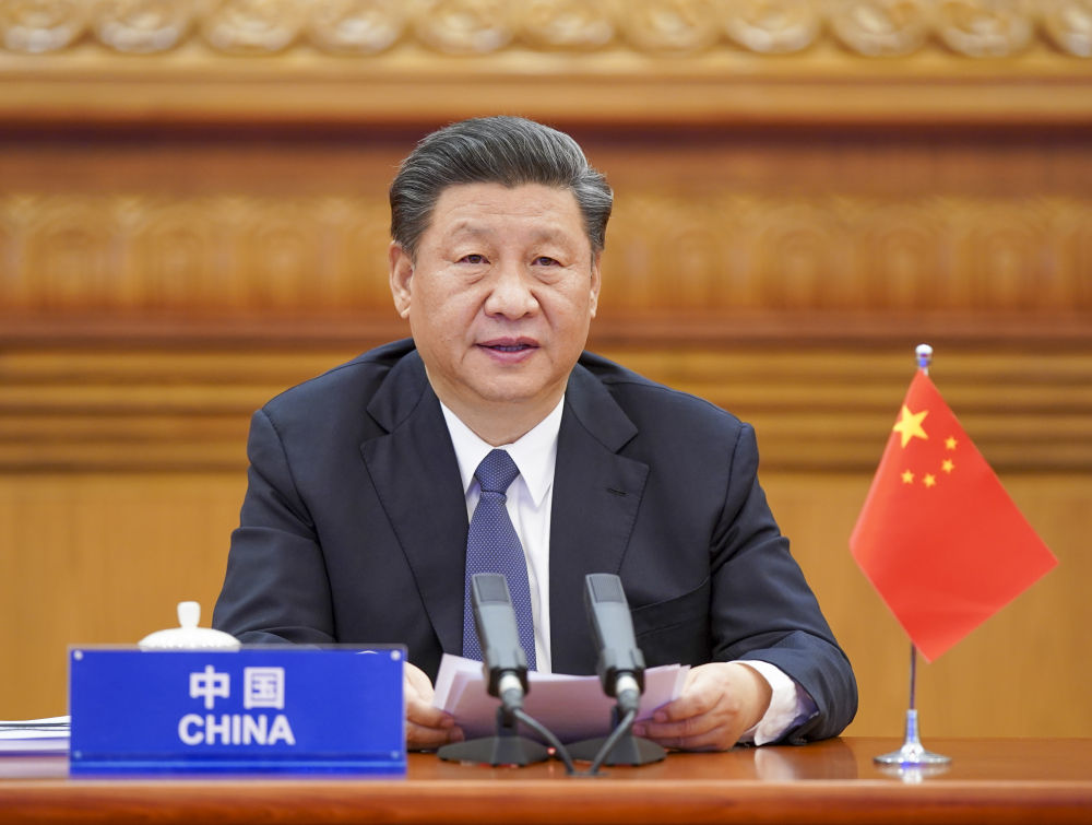 2020年3月26日，习近平在北京出席二十国集团领导人应对新冠肺炎特别峰会并发表题为《携手抗疫 共克时艰》的重要讲话。新华社记者 李学仁 摄